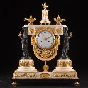 A Magnificent Directoire Portico Clock, With Patinated Caryatids, Signed Piolaine