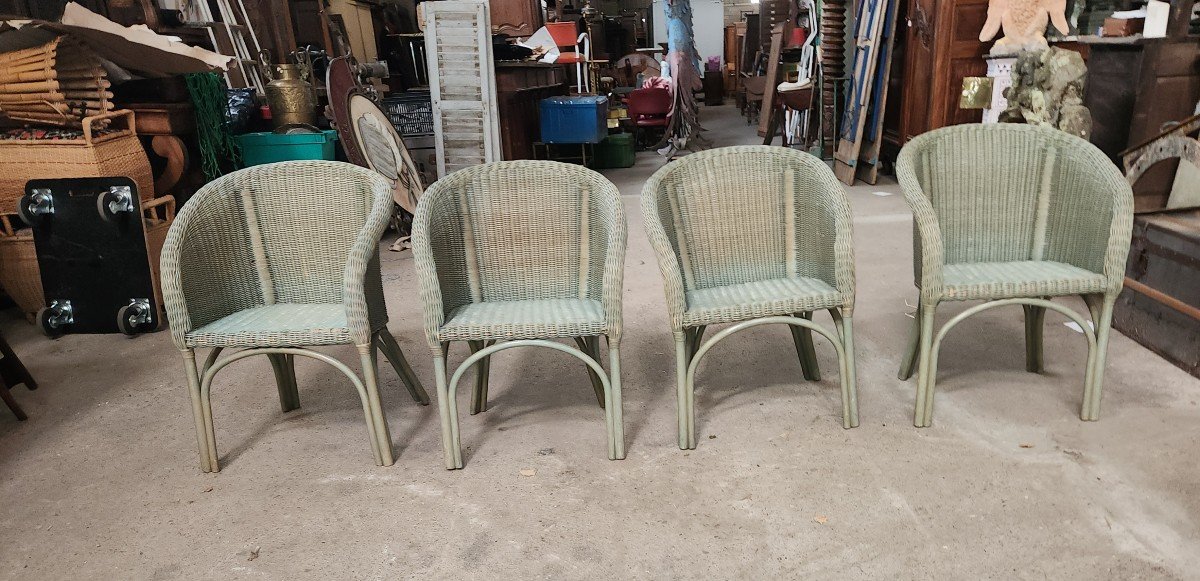 Suite De Quatre Fauteuils En Osier Des Années 70