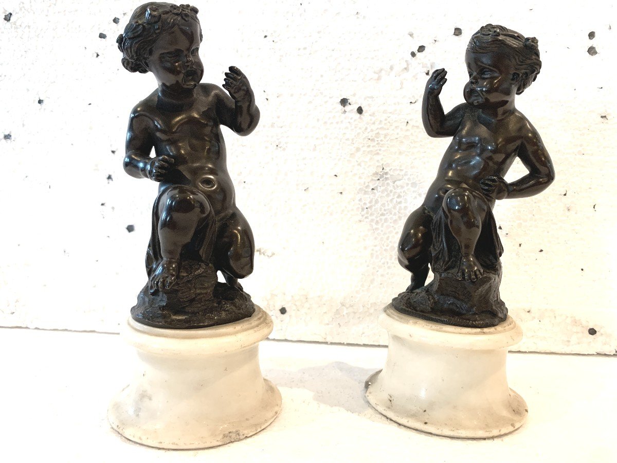 Pair Of Bronze Putti With Brown Patina On White Marble Base, 20th Century