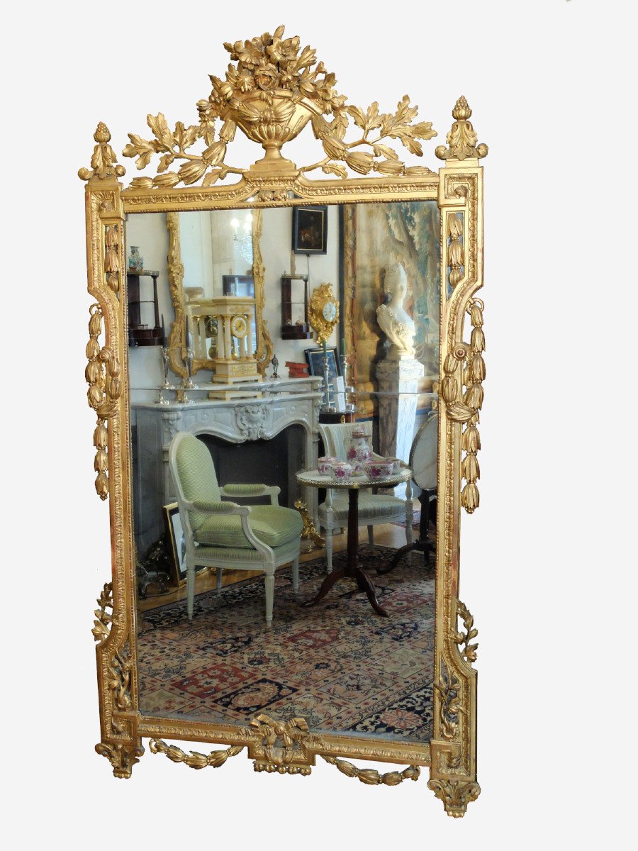 Important miroir d'époque Louis XVI en bois doré