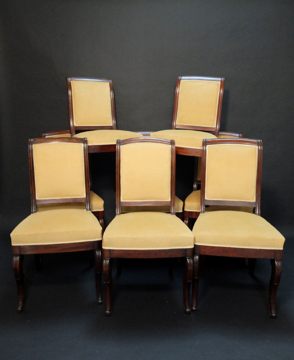 Suite de 8 chaises Restauration par Jeanselme