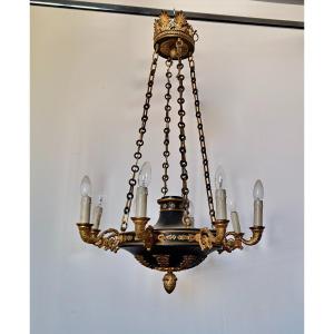 Lustre de style restauration à 8 lumières en bronze doré et tôle laquée XIXe