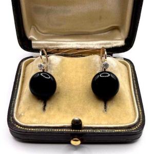 4963. Boucles d'oreilles en or avec onyx et diamants