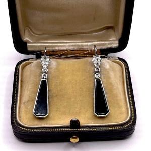 4663. White Gold Earrings With Diamonds And Onyx