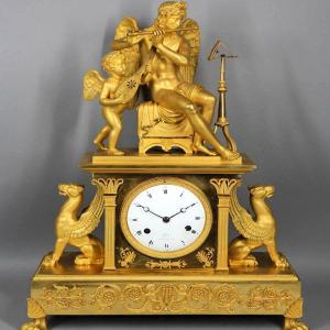 Horloge de cheminée Empire en bronze du début du XIXe siècle (1810)  avec Apollon et Orphée