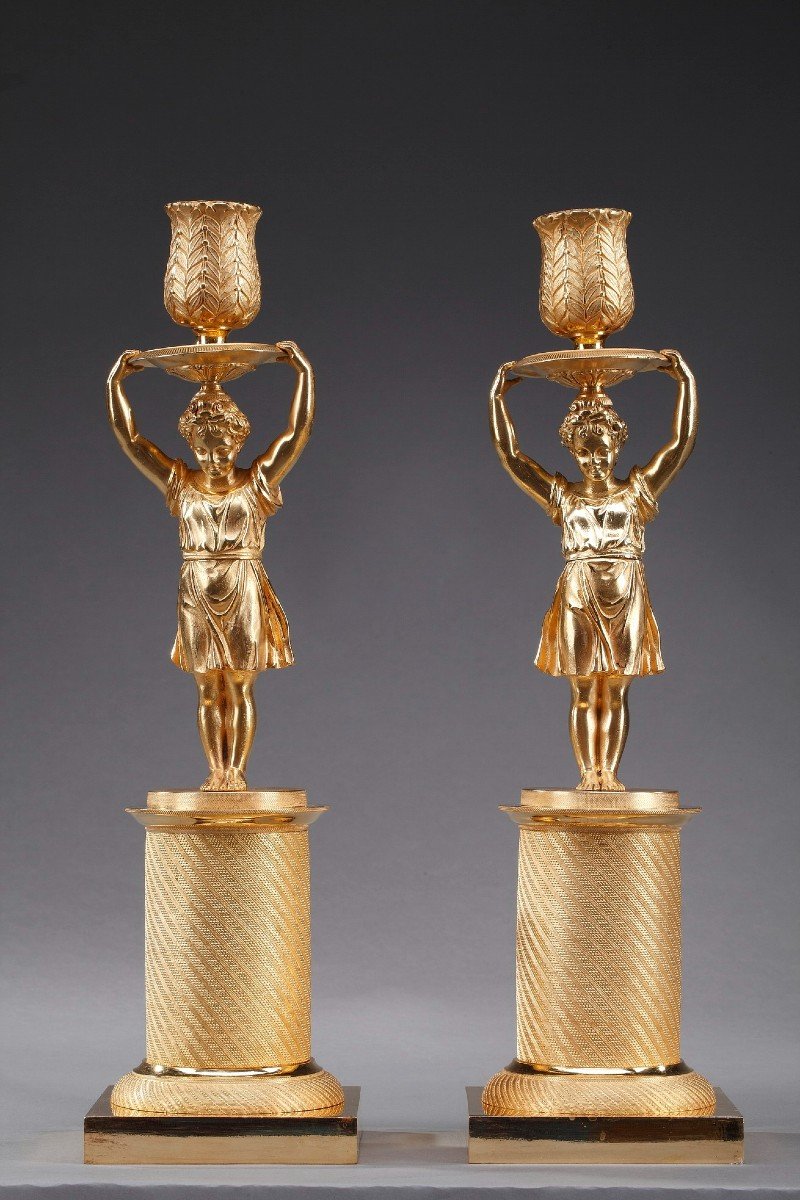 Pair Of Restoration Candlesticks In Gilt Bronze