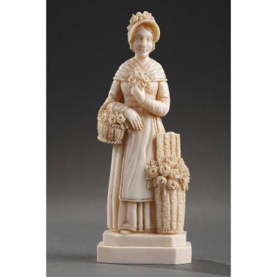 An Ivory Carved Figure. Signed Migeon. 