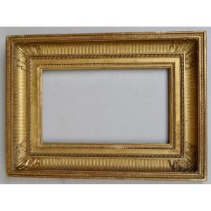 Frame With Channels In Wood And Golden Stucco