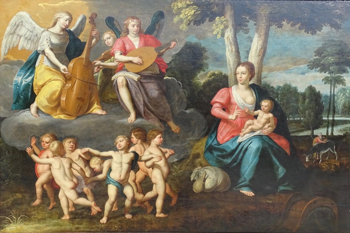 Flemish School 17th Century, The Virgin And Child Surrounded By Cherubs And Musical Angels