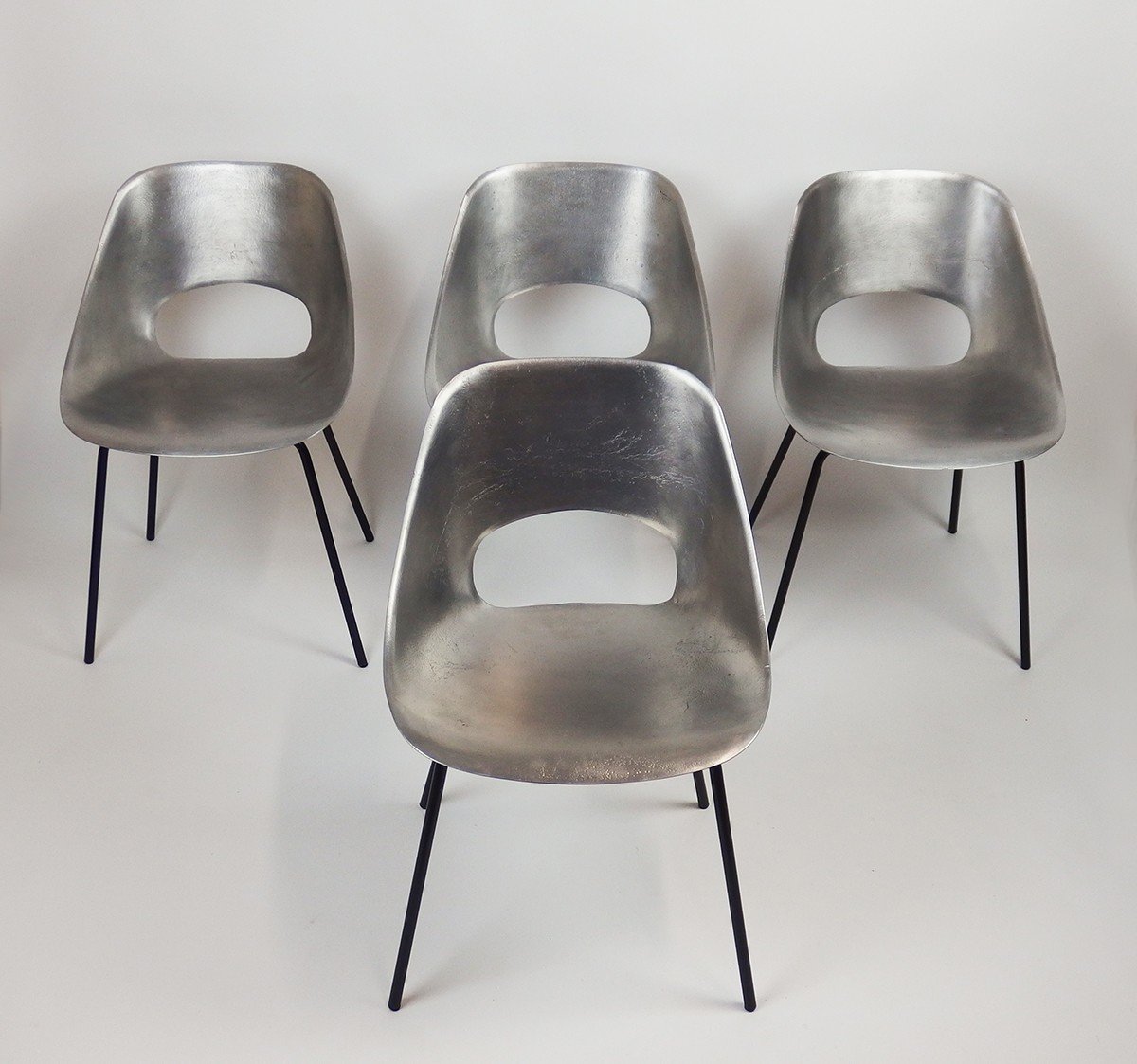 Four Cast Aluminum Chairs By Pierre Guariche
