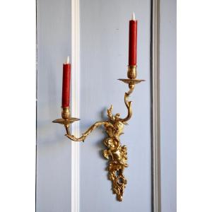 Pair Of Gilt And Chiseled Bronze Sconces With Two Arms Of Light
