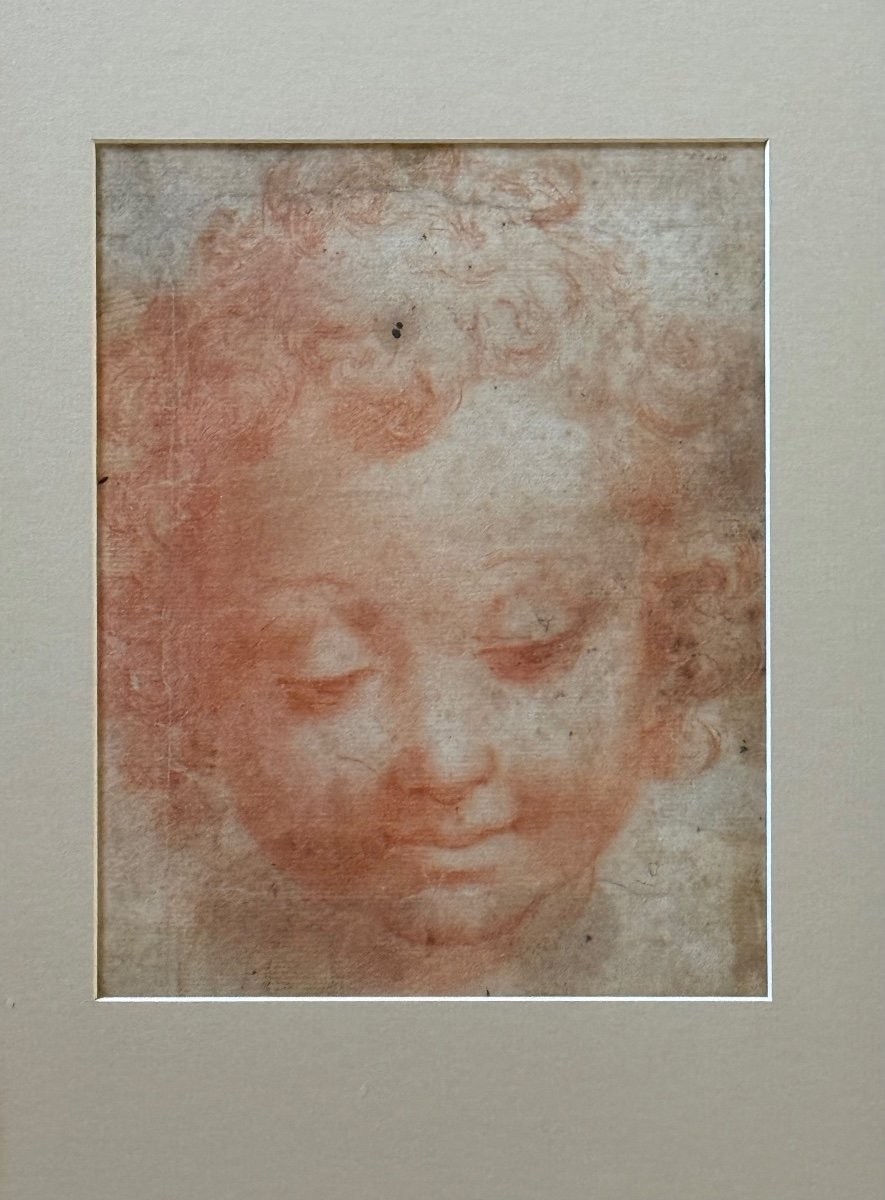 A Red Chalk Drawing Of A Childs Face.-photo-3