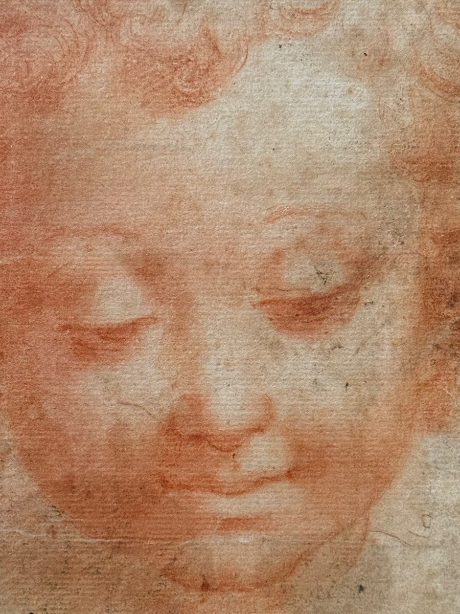 A Red Chalk Drawing Of A Childs Face.-photo-4