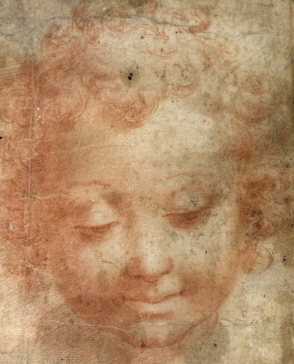 A Red Chalk Drawing Of A Childs Face.-photo-4