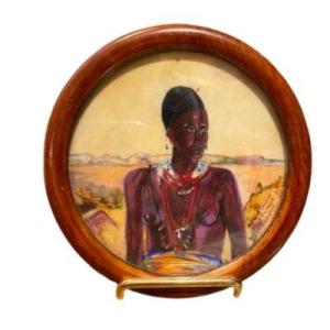 Miniature en ivoire représentant une femme africaine parée de colliers par L. Lamy