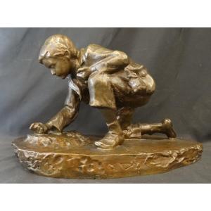 "Le joueur de billes" bronze de élie Raset