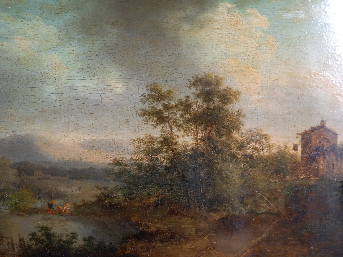 Flemish School 18th Century: Landscape Under A Stormy Sky 