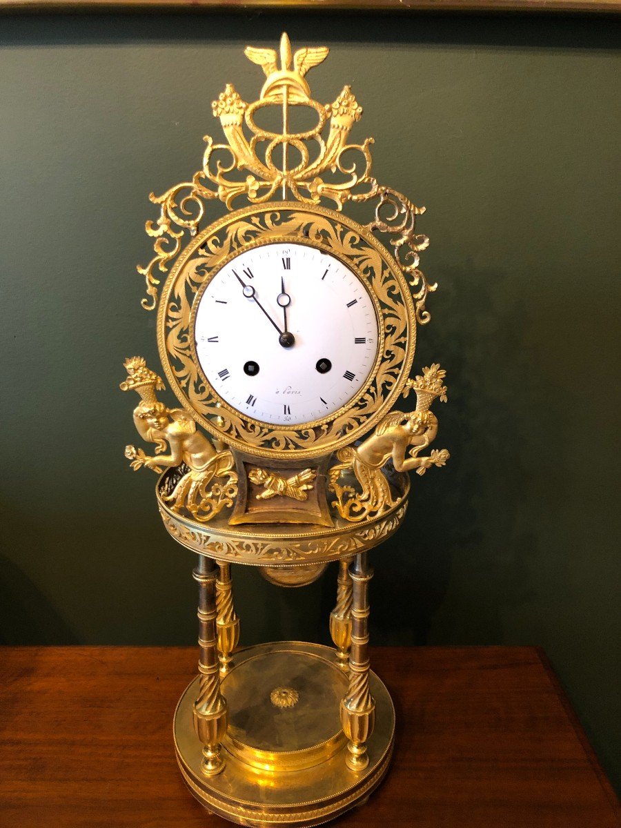 Directoire Period Clock In Gilt Bronze