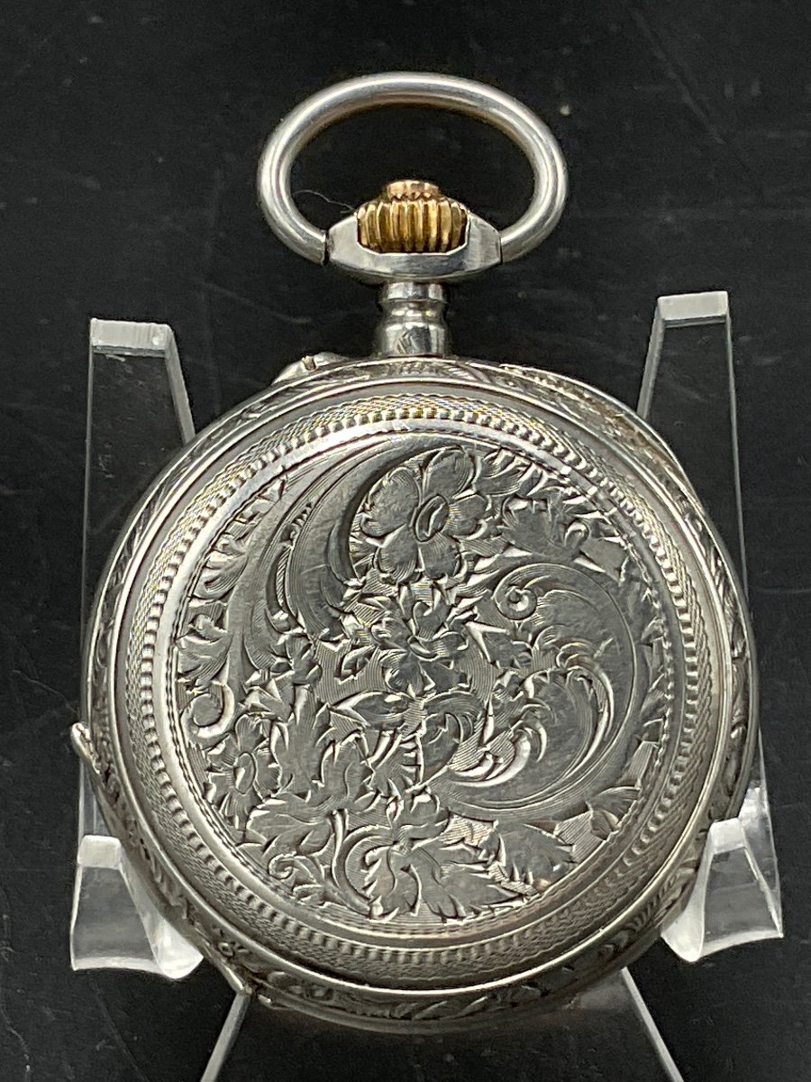 Montre à Gousset Ou De Poche Savonnette En Argent à Décor De Feuillage,fleurs Et D’arabesque.