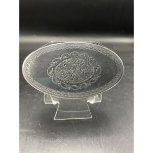 Oval Shaped Snuff Box In Chiseled And Guilloché Sterling Silver Decorated With Musical Attributes.