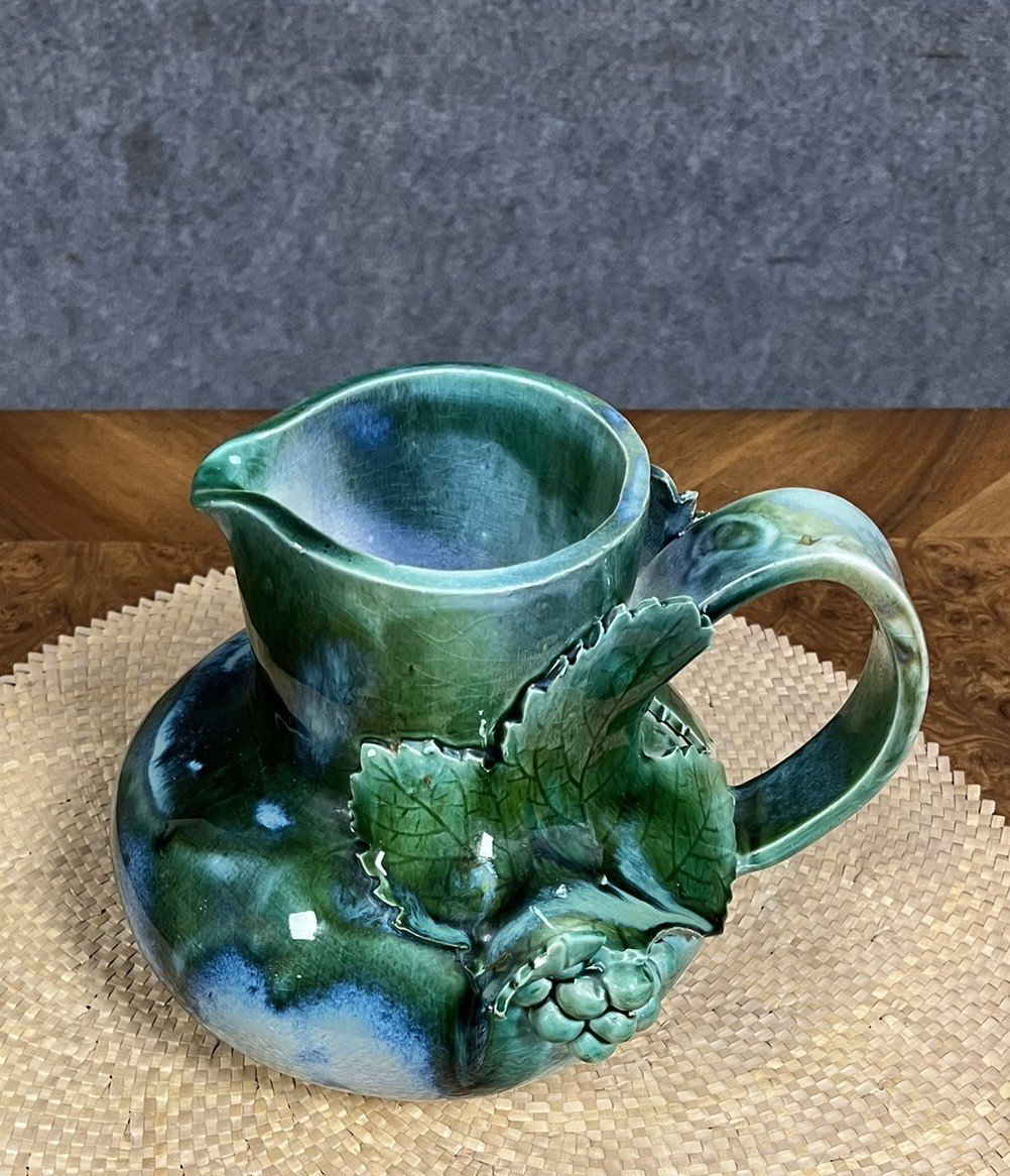 Michelle Bonfort: Blue Enameled Earthenware Jug Decorated With A Bunch Of Grapes 