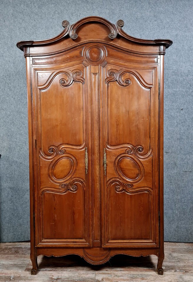 Louis XV Period Cauchoise Cabinet With Gendarme Hat In Solid Pine Circa 1750