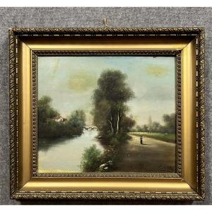 E Petit: Oil On Canvas Animated Landscape On The Bank Of A River 