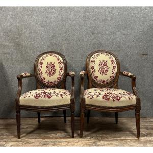 Pair Of Louis XVI Period Armchairs In Walnut 