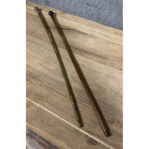 Two "casse Tête" Canes With Lead Knobs 