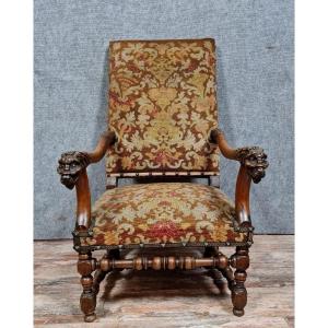 Renaissance Armchair In Carved Walnut With Lion Head Decoration On The Armrests, 19th Century