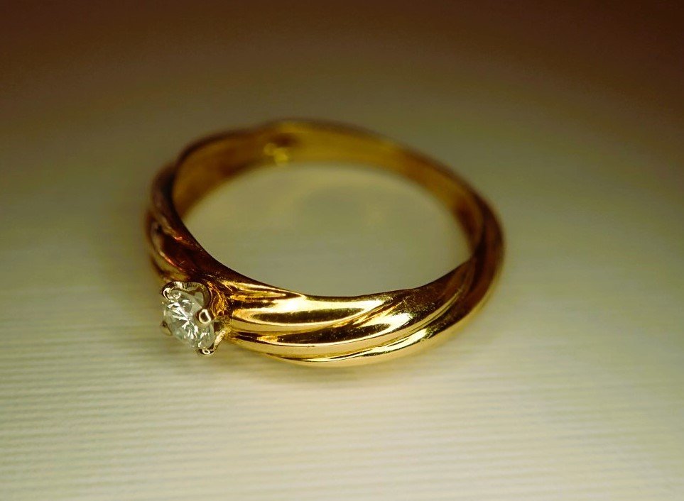 18 Carat Gold Bangle Ring Set With A Diamond