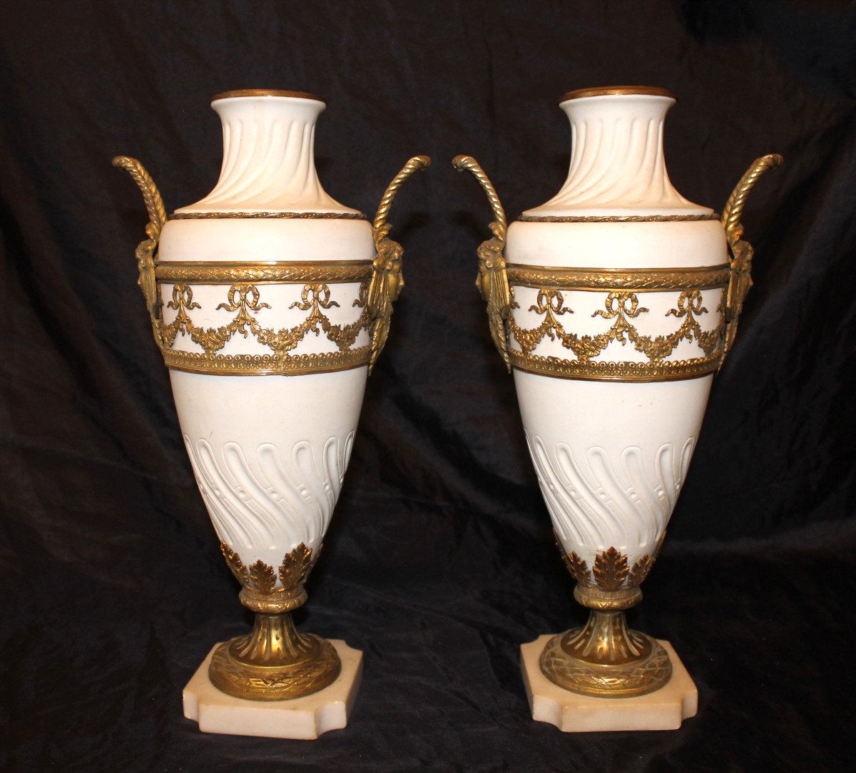 Pair Of Biscuit Vases With Bronze Ornamentation On Marble Base, 19th Century, Louis XVI Style