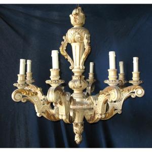 Grand lustre en bois sculpté rechampi de style Louis XIV à 8  bras de lumière époque 19ème