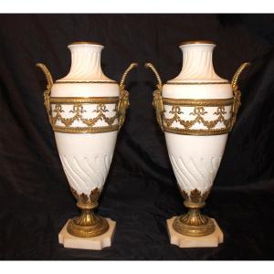 Pair Of Biscuit Vases With Bronze Ornamentation On Marble Base, 19th Century, Louis XVI Style