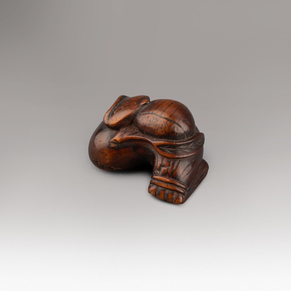 Netsuke Depicting Chestnuts Placed On  Hoteï 's Bag. Edo Japan