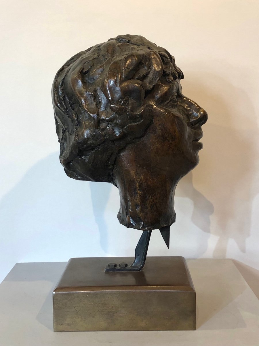 Bronze Head Of A Woman From The 1950s. -photo-1