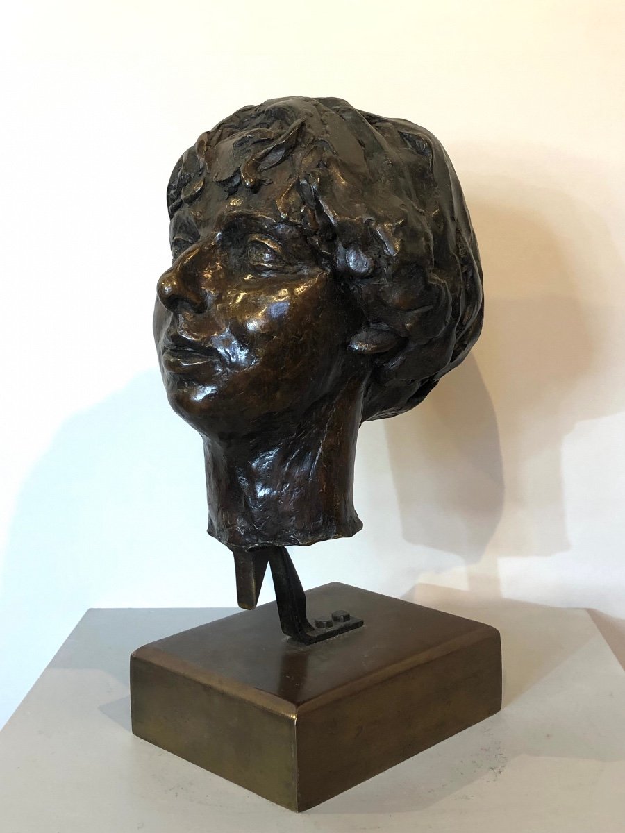 Bronze Head Of A Woman From The 1950s. -photo-4