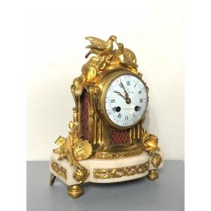 Louis XVI Style Clock In Gilt Bronze. 