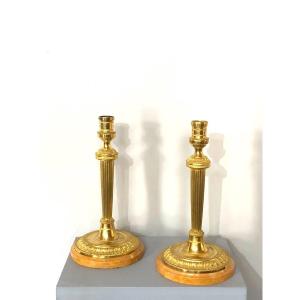 Pair Of Louis XVI Style Candlesticks In Gilt Bronze.