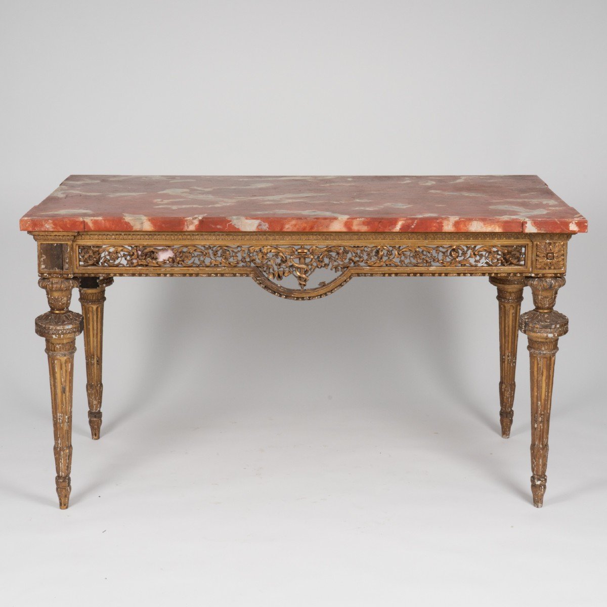 Table de milieu  en bois sculpté et doré de style Louis XVI, XIXe