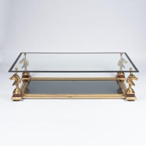 Dans le style de la Maison Charles, table basse à double plateau en verre et laiton, XXe