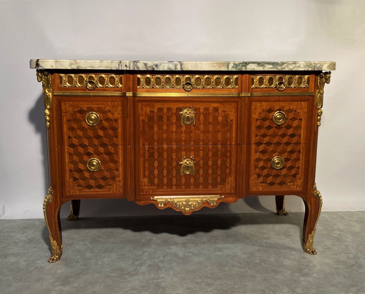 Large 18th Century Marquetry Chest Of Drawers In The Style Of Simon Oeben.