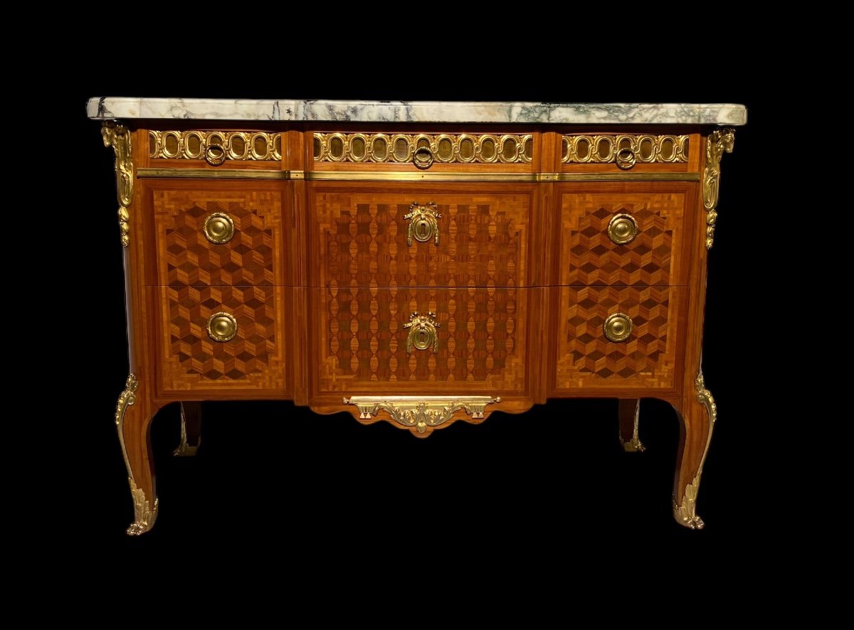 Large 18th Century Marquetry Chest Of Drawers In The Style Of Simon Oeben.