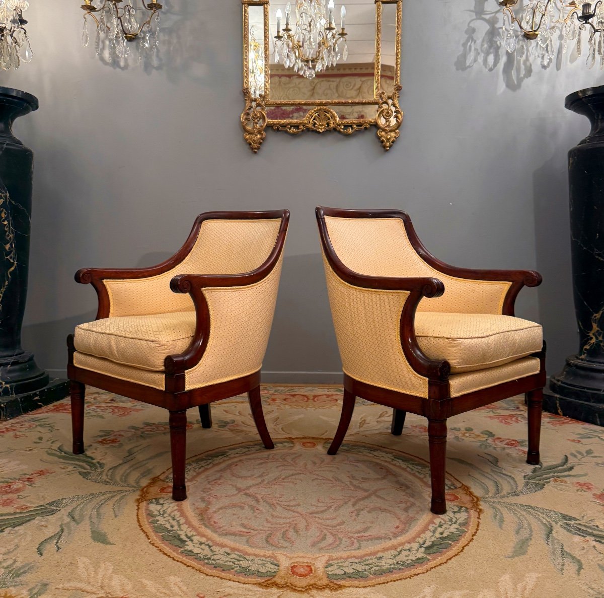 Pair Of Mahogany Officer's Bergeres From The Empire Period, Circa 1810