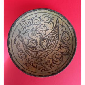 Coupe céramique peignée Iran Nishapur X iéme  décor oiseau au centre.