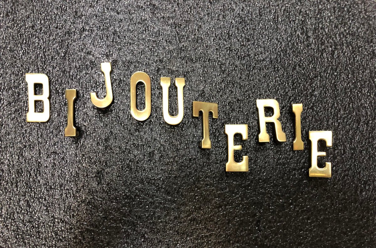 Old Small Letters Jewelry Store Sign.