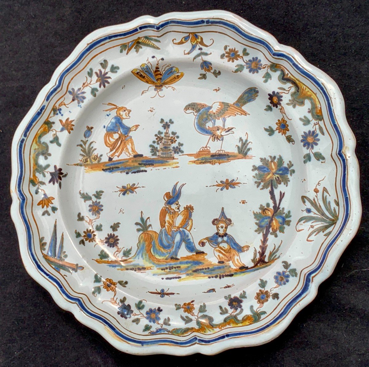 Small Lyon 18th Ceramic Plate Grotesque And Chinese Characters, Bernardion Gomes Collection