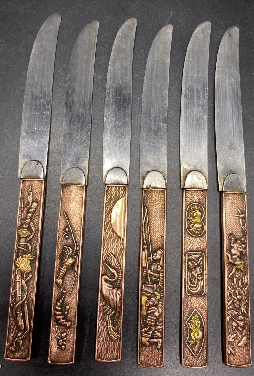 A Set Of Six Japanese Brass And Steel Blade Knives From The 1900s