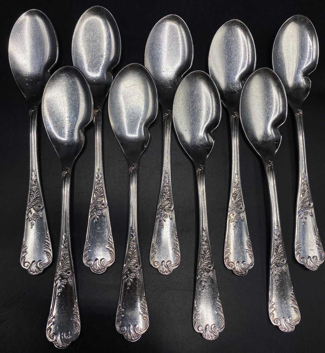 A Set Of 9 French Silver Plated Individual Sauce Spoons From The 1950s