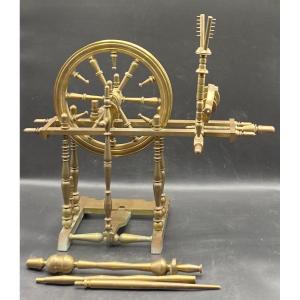 A Reproduced Spinning Wheel In Bronze On A Smaller Scale, With Mechanism From The 1950s French…